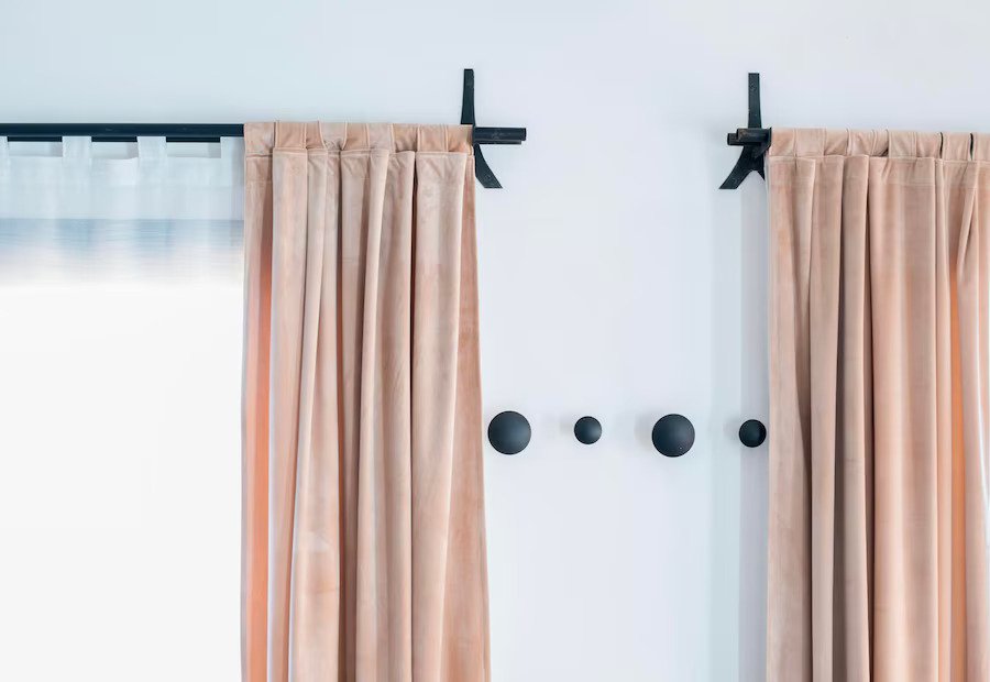 low-angle-view-clothes-hanging-wall_1048944-4199785